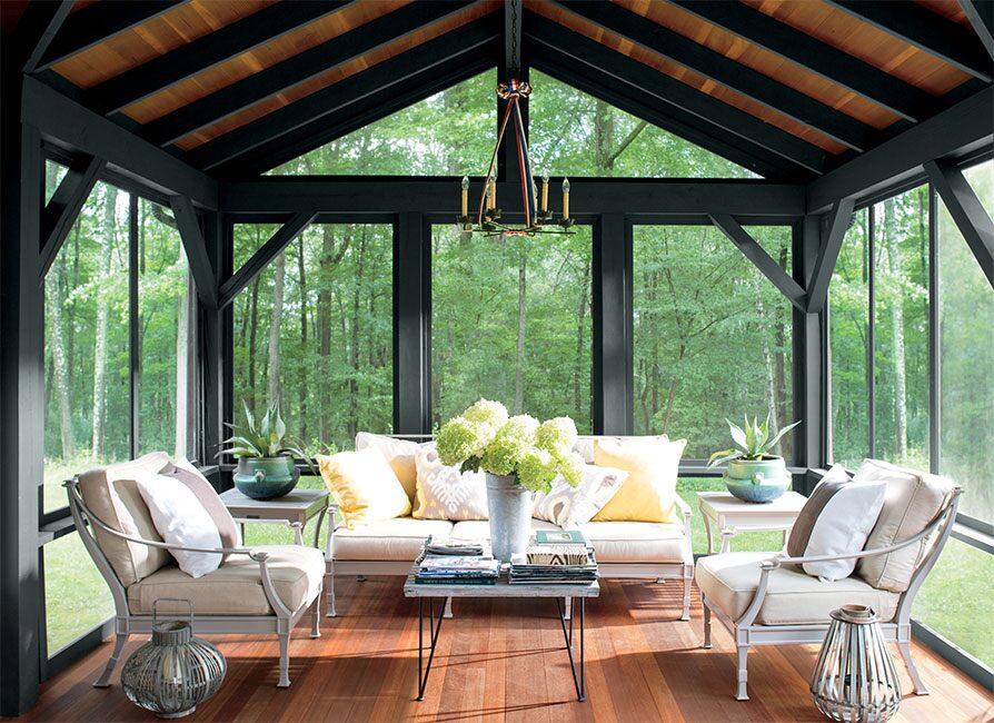 Arborcoat Translucent Stain in Mahogany on floors and ceiling; posts in Arborcoat Solid stain in Black.